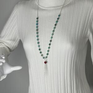 long turquoise colored beaded necklace with tassel pendant costume jewelry boho